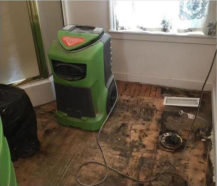 dehu and floor removed in a bathroom