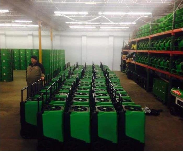 Rows of our air movers being stored in our warehouse